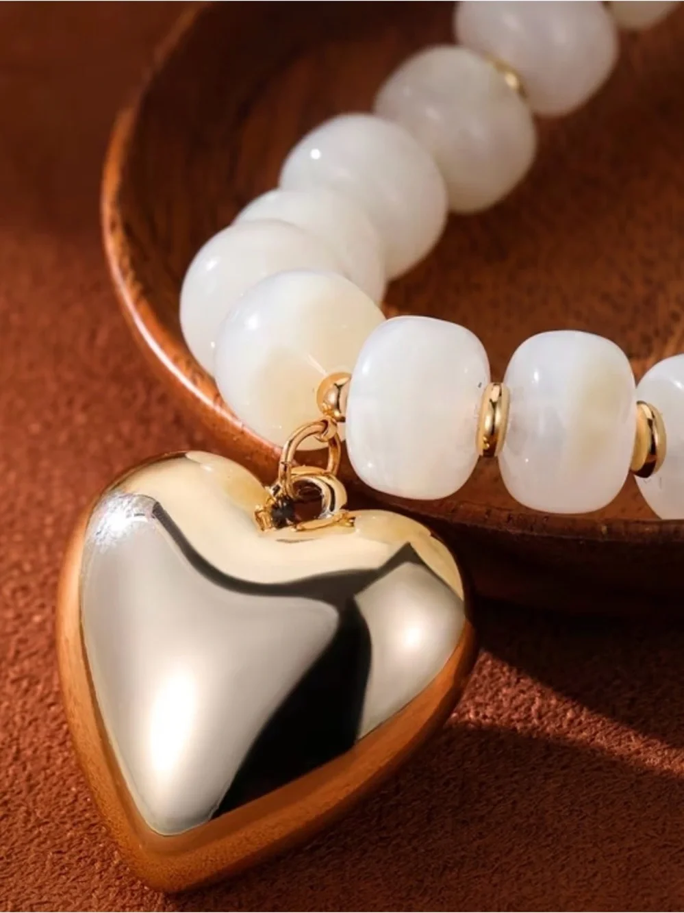 White Beaded Necklace with Gold Heart Pendant